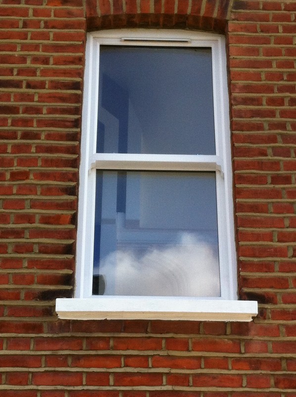 uPVC sash window on Victorian red brick house in Marlow